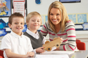 children and their teacher inside the classroom